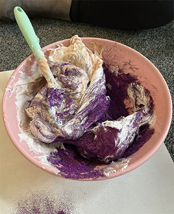 Sparkly purple slime helps with expression in play therapy